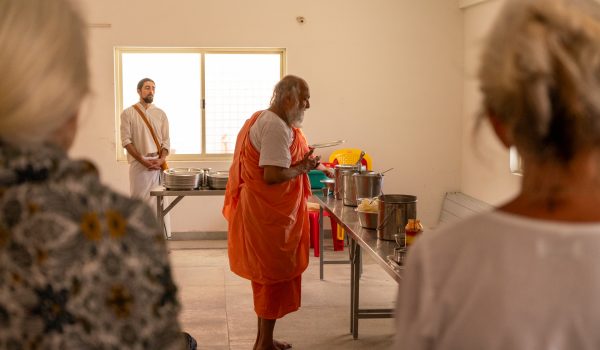 Shri Babaji blessing the food