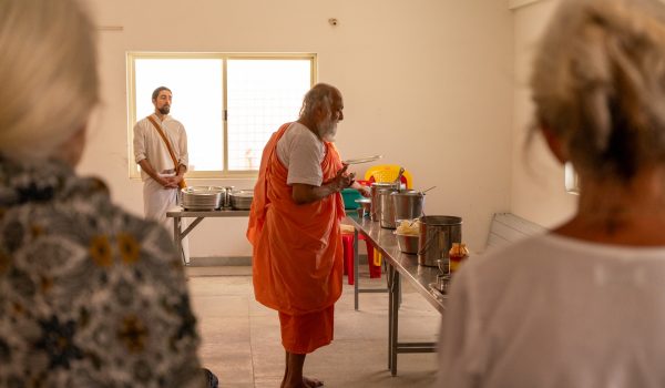 Shri Babaji blessing the food